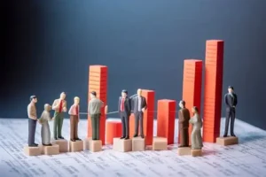 people lookalike figurines standing on different blocks representing social and working environment differences